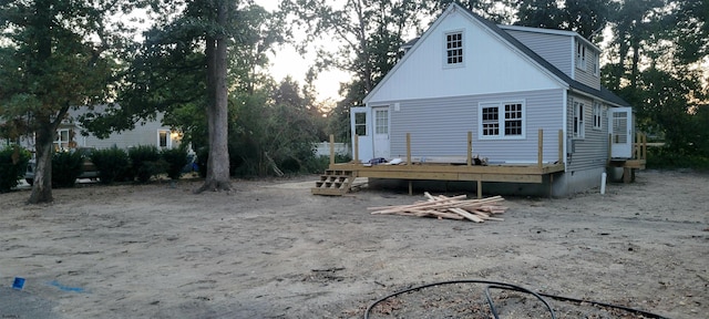 rear view of house with a deck