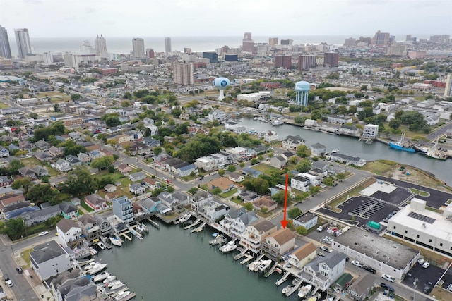 bird's eye view with a water view