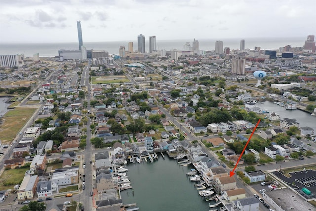 drone / aerial view featuring a water view