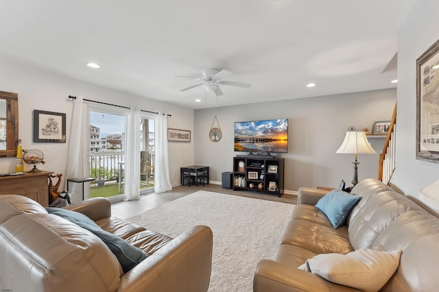 living room featuring ceiling fan