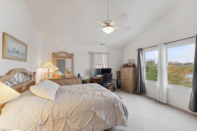 bedroom with ceiling fan, light colored carpet, and high vaulted ceiling