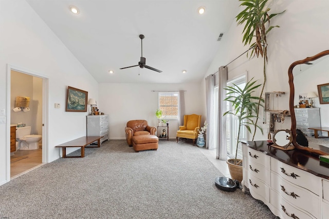 sitting room with high vaulted ceiling, ceiling fan, and carpet flooring