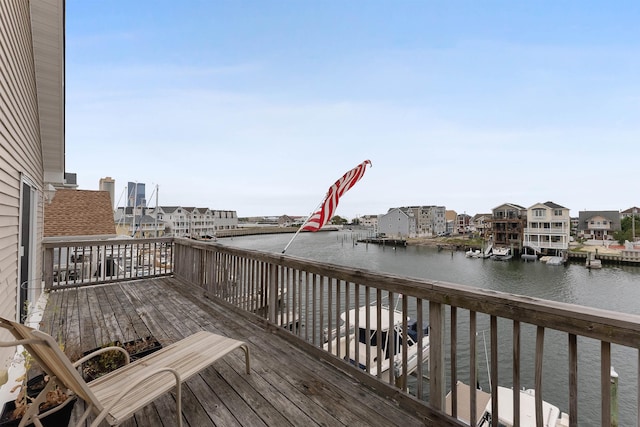 deck featuring a water view