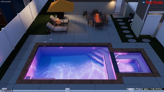 view of swimming pool featuring a patio, an in ground hot tub, and exterior bar