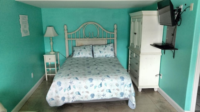 bedroom with tile patterned flooring