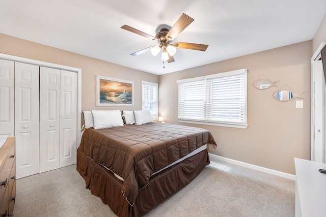 bedroom with light carpet and ceiling fan