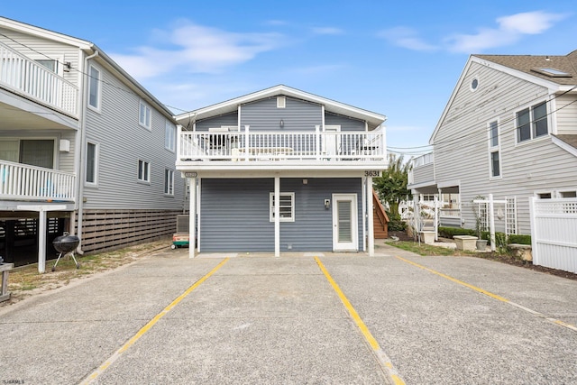 view of front of home with a balcony