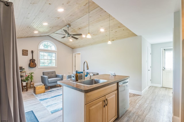 kitchen featuring ceiling fan, an island with sink, sink, stainless steel dishwasher, and light wood-type flooring