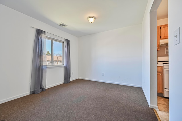 view of carpeted spare room