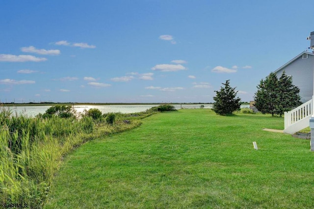 view of yard with a water view