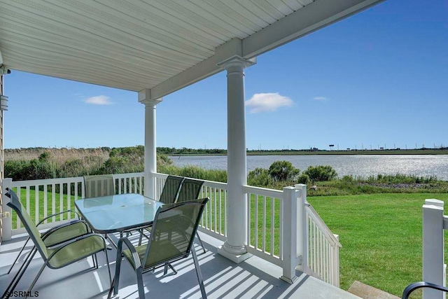 exterior space with a water view