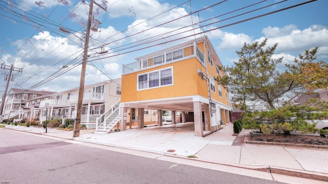 view of front of house with a carport