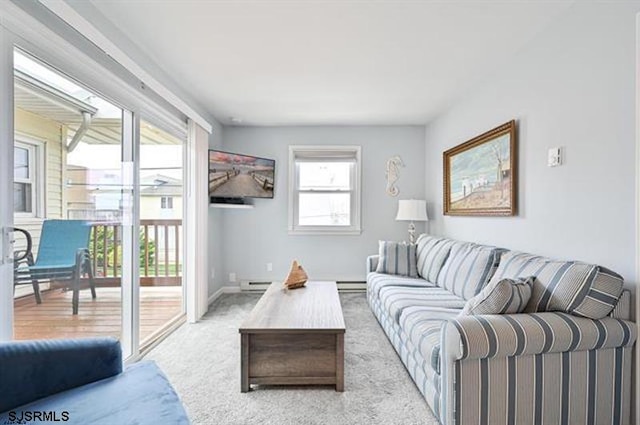 carpeted living room with a baseboard radiator