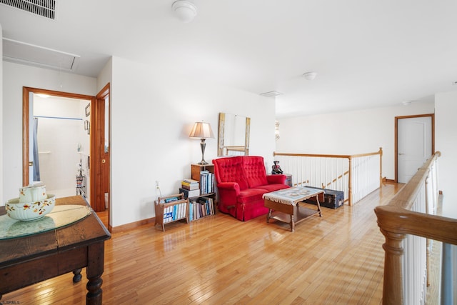 living room with light hardwood / wood-style flooring