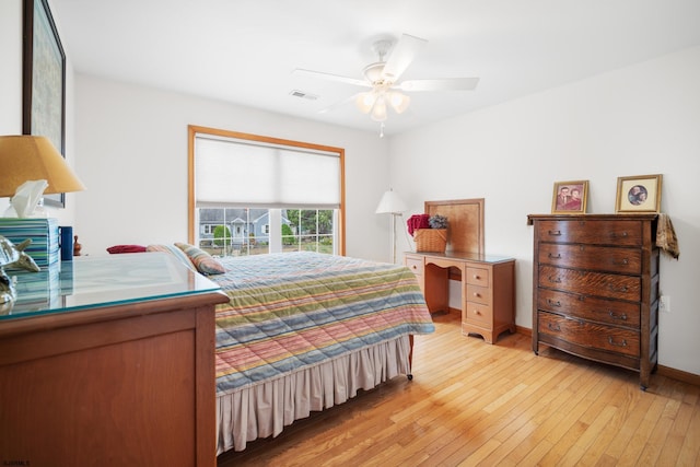 bedroom featuring ceiling fan and light hardwood / wood-style floors