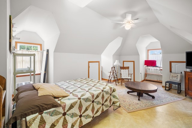 bedroom with lofted ceiling and ceiling fan