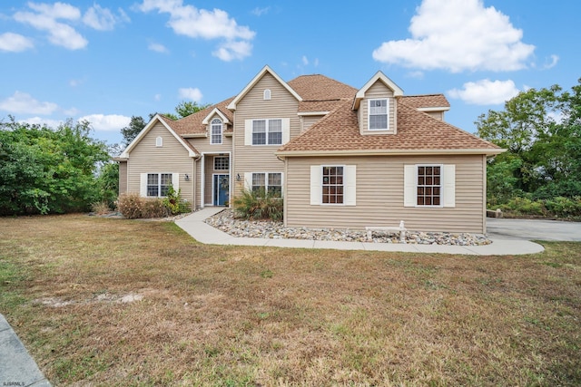 front facade with a front lawn