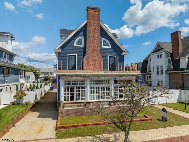 view of front of home with a front yard