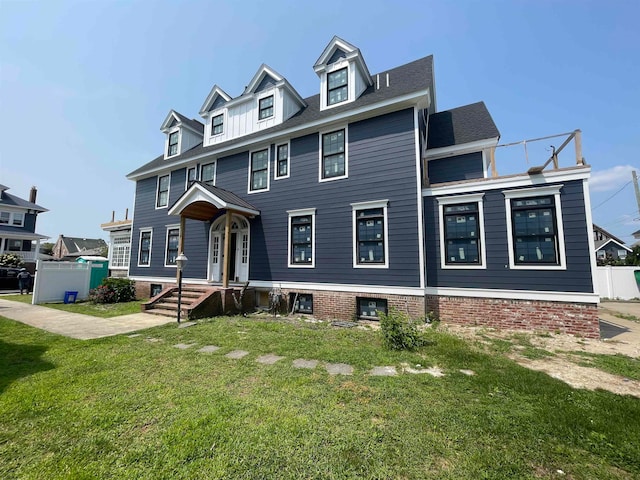 view of front of home featuring a front lawn