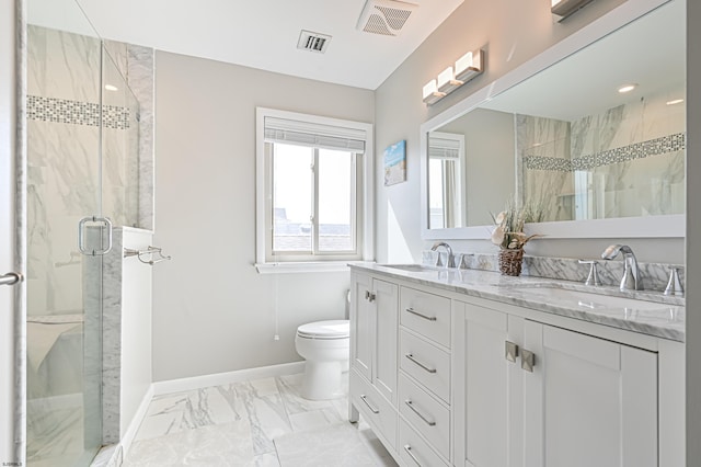 bathroom with a shower with door, toilet, and vanity