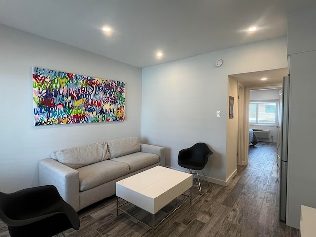 living room with dark hardwood / wood-style flooring