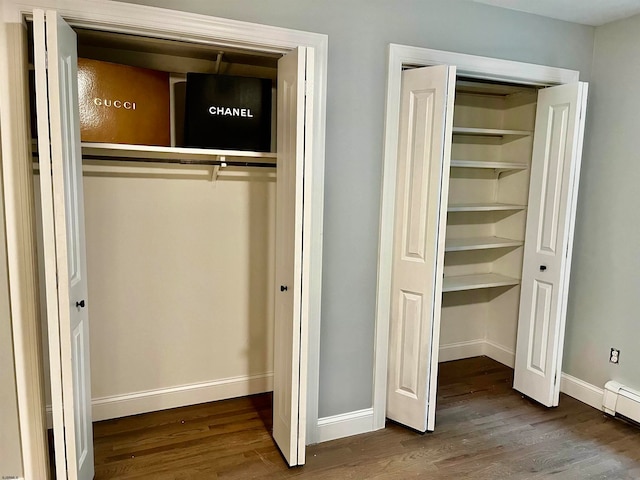 closet with a baseboard heating unit