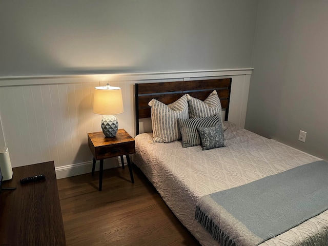 bedroom featuring dark wood-type flooring