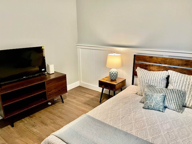 bedroom with light wood-type flooring