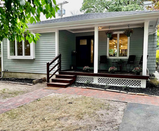 property entrance featuring covered porch