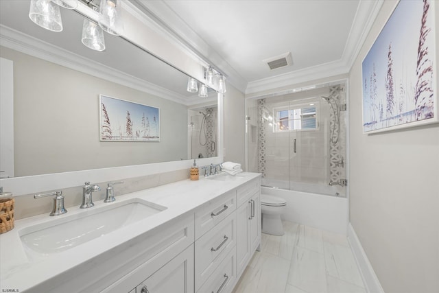 full bathroom featuring ornamental molding, shower / bath combination with glass door, vanity, and toilet