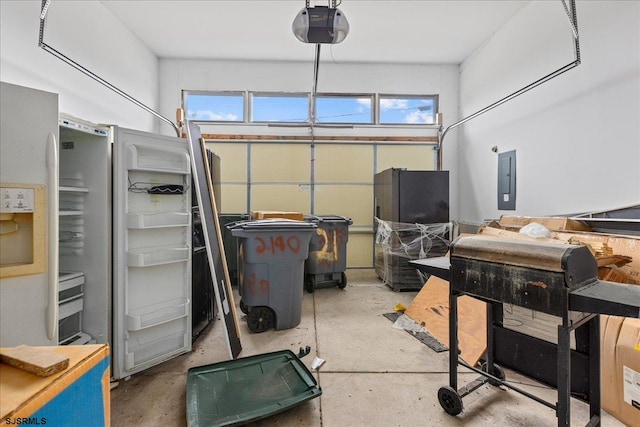 interior space featuring a garage door opener and electric panel