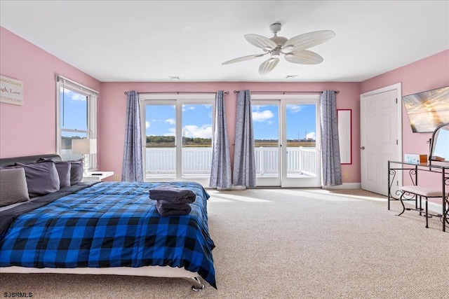 bedroom featuring carpet flooring, ceiling fan, and access to outside