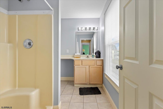 bathroom featuring vanity and tile patterned flooring