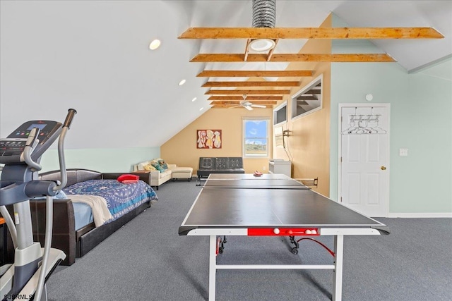 playroom with carpet floors and vaulted ceiling with beams