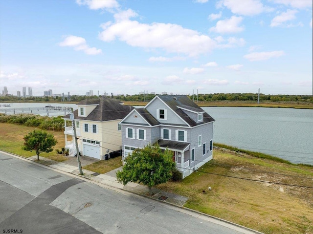 bird's eye view with a water view