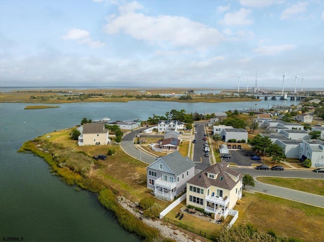 drone / aerial view featuring a water view