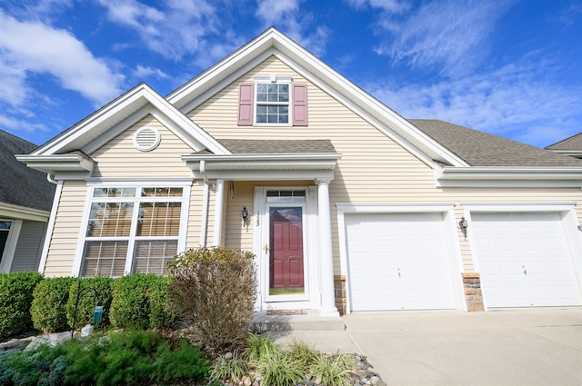 view of front of property with a garage