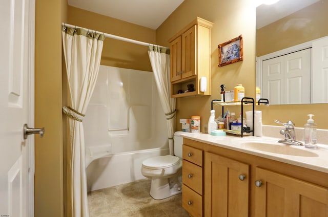 full bathroom featuring vanity, shower / tub combo, toilet, and tile patterned flooring