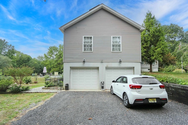 view of property exterior featuring a garage