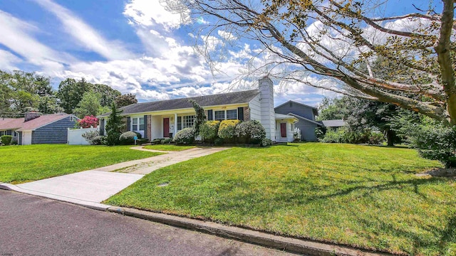 ranch-style home with a front yard