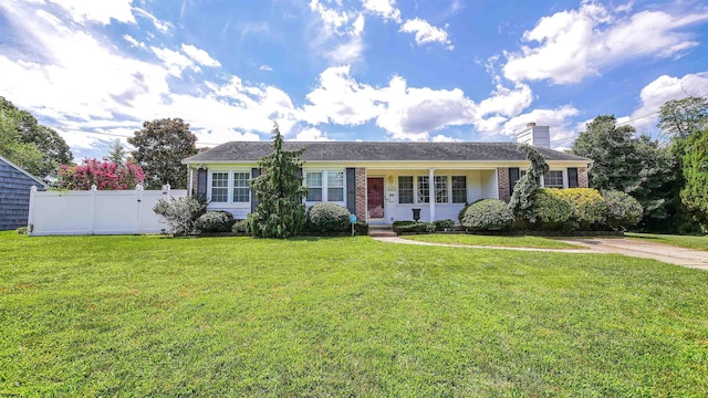 ranch-style house with a front yard