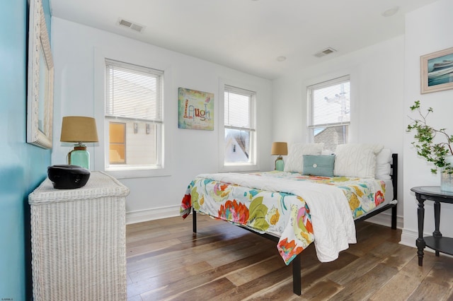 bedroom featuring hardwood / wood-style flooring