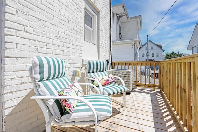 wooden terrace with central AC unit