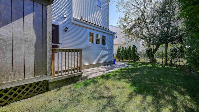 view of yard with a wooden deck