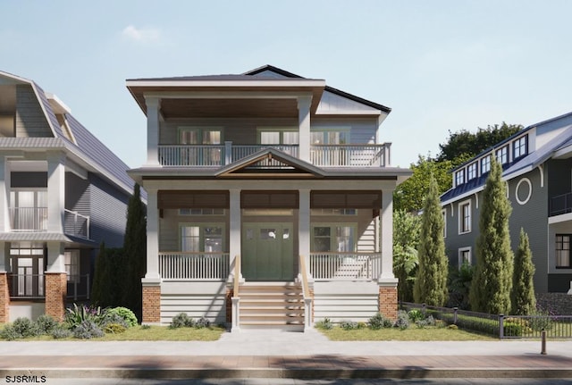 view of front of house with a balcony and covered porch