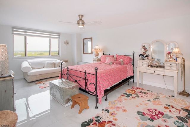 bedroom with light tile patterned floors and ceiling fan