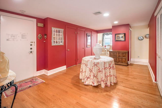 living area with light hardwood / wood-style floors