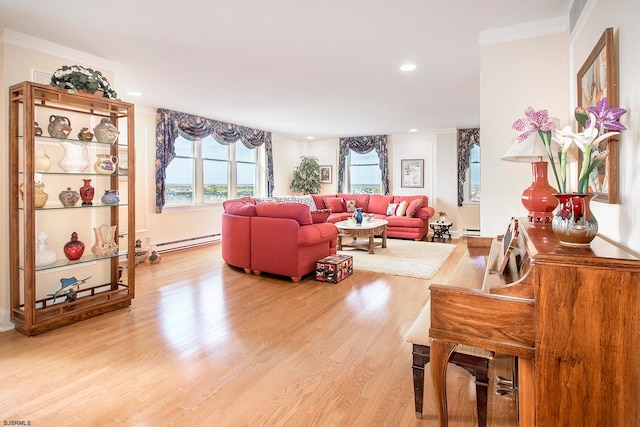 living room with ornamental molding, a baseboard radiator, and light hardwood / wood-style floors