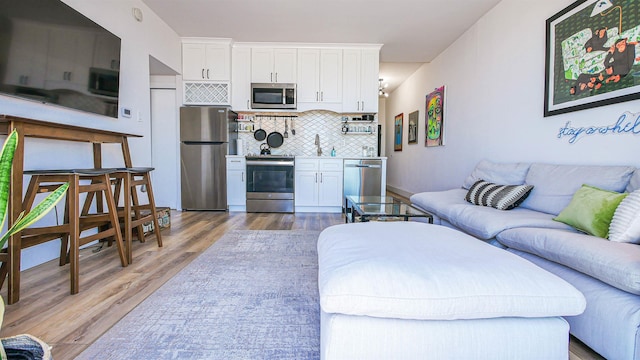 living room with light wood-type flooring