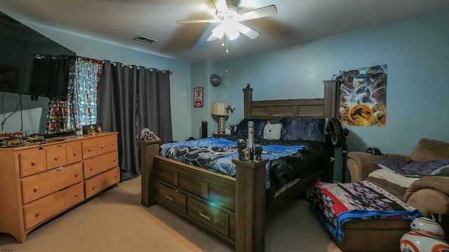 bedroom featuring ceiling fan and light colored carpet